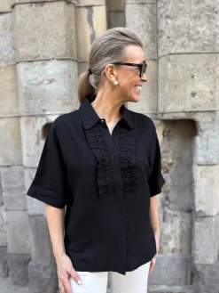 Marianne frillapaita; musta